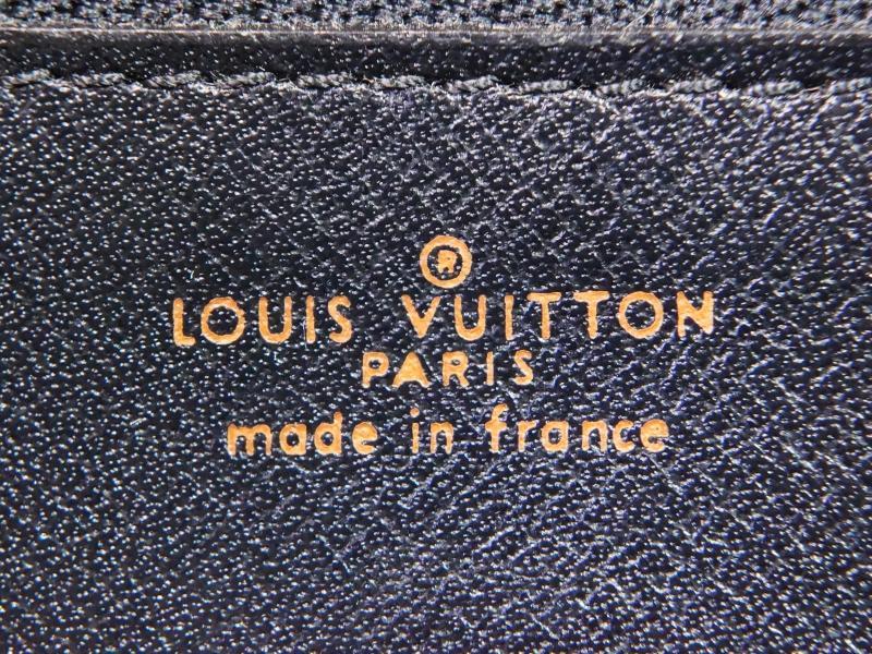 Louis Vuitton 2000s Lexington Black Pochette · INTO