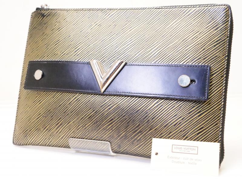 Louis Vuitton logo plate clutch bag