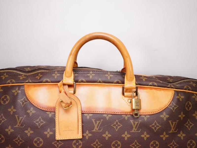 Cloth travel bag Louis Vuitton Gold in Cloth - 34061930